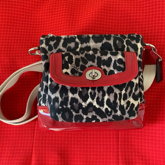 Coach Handbags - HOLD FOR LAVONNE Coach Ocelot Swingpack Cheetah Print Crossbody Bag